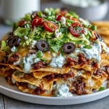 Easy Taco Dip Cups with creamy layers and fresh toppings, perfect for party snacking or festive gatherings.