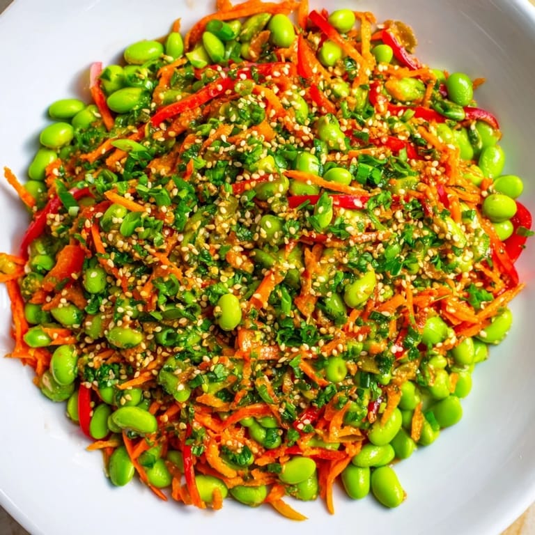 Enjoy a quick and easy Asian Edamame Salad bursting with fresh flavors, perfect as a light lunch.