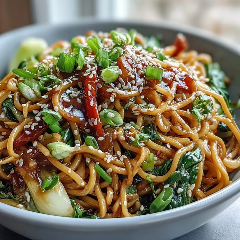 Healthy, low-carb Shirataki Noodle Bowl with colorful veggies and a glossy ginger sauce, perfect for a quick dinner.