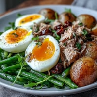 Vibrant Spring Niçoise Salad overflowing with fresh ingredients, perfect for lunch.